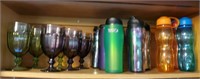 Top row in kitchen cupboard - water glasses and