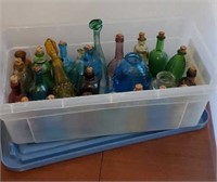 Tub of small bottles