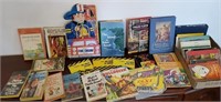 Box of books including Charlie brown, Walt