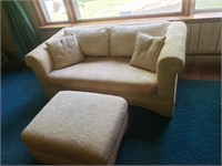 Vintage love seat with ottoman.
