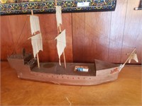 Large Wooden sail boat.
