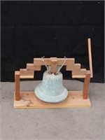 Vintage bell on a wooden stand