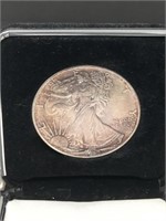 American Eagle silver dollar coin in its case