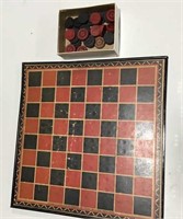 Metal frame checker board with game pieces