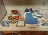 hot pads, trivets, dish towels