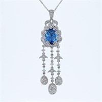 14KT White Gold 4.90ct Blue Topaz and Diamond Pend