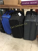 3 LARGE ROLLING SUITCASES