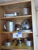 Contents of Cabinet- Misc Pots, Pans