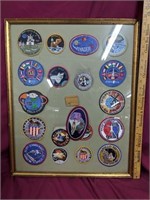 Framed vintage NASA patches