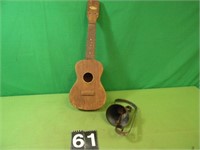 Harmony Guitar and Dinner Bell