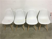 4 white chairs