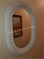 oval white wicker mirrow