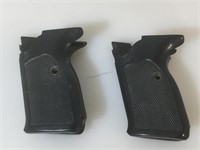 2 sets of plastic pistol grips - both are the