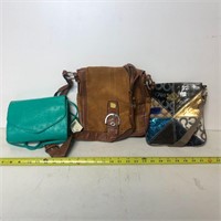 Two Coach Handbags and one Sirco Handbag