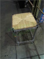 Contemporary metal stool w/woven wicker seat