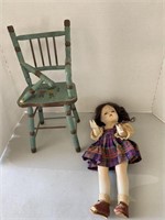 Vintage baby doll and chair