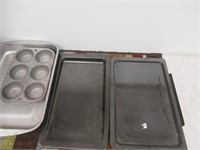 3 Baking Sheets and a Cup Cake Pan