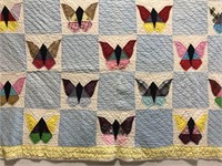 Hand stitched butterfly pattern patchwork quilt