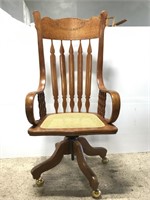 High back wooden rocker chair on caster wheels