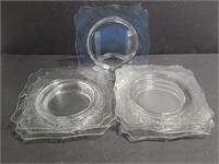 Seven square clear glass plates