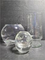 Three clear glass vases