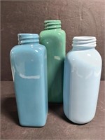 Three ceramic bottles