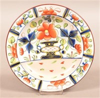 Gaudy Dutch Soft Paste China Urn Pattern Plate.