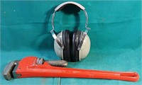 Safety ear defenders and Mastercraft 18" wrench