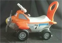 Battery operated push along toy,