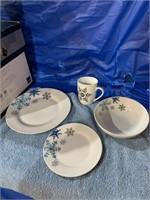 Four  place setting of snowflake dishes - missing