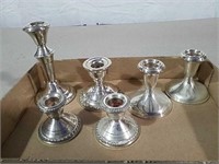 6 candlesticks all marked weighted Sterling