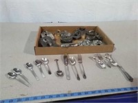 Vintage cookie cutters and miscellaneous flatware