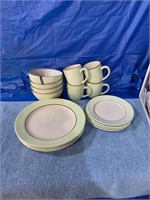 Four place setting of Moda Stoneware dishes
