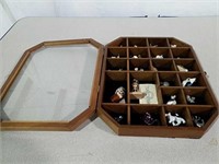 Shadow box with miniature figures mostly animals