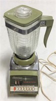 Vintage osterizer blender with glass container