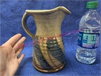Signed pottery pitcher