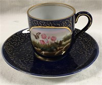 Blue & Flowered Cup And Saucer