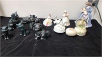 Large group of figurines and cat statues