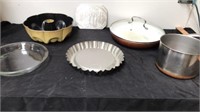 Group of pans, pie pans and more