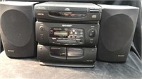 2 sharp speakers with 3 disc radio cd player