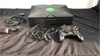 Xbox console with co troller and cords untested