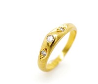 Three stone diamond and 18ct rose gold ring