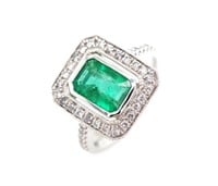 Emerald, diamond and 18ct white gold ring