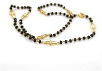 22ct yellow gold and onyx beaded necklace