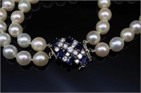 A good pearl necklace set diamond and sapphire