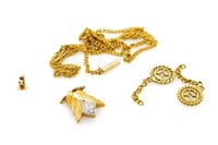 Gold jewellery parts.