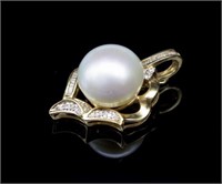 Mabe pearl, diamond and 14ct yellow gold enhancer