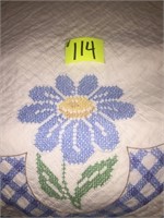 Embroidered quilt hand quilted