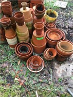 Assortment of clay pots ranging from 2 inch to 10