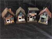 Four birdhouses.